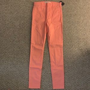 HOLLISTER coral colored skinny jeans. NEW WITH TAG